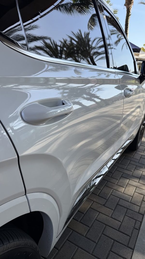 Door panel of a white vehicle